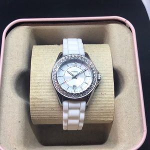 Ladies Fossil watch surrounded by sparkly crystal
